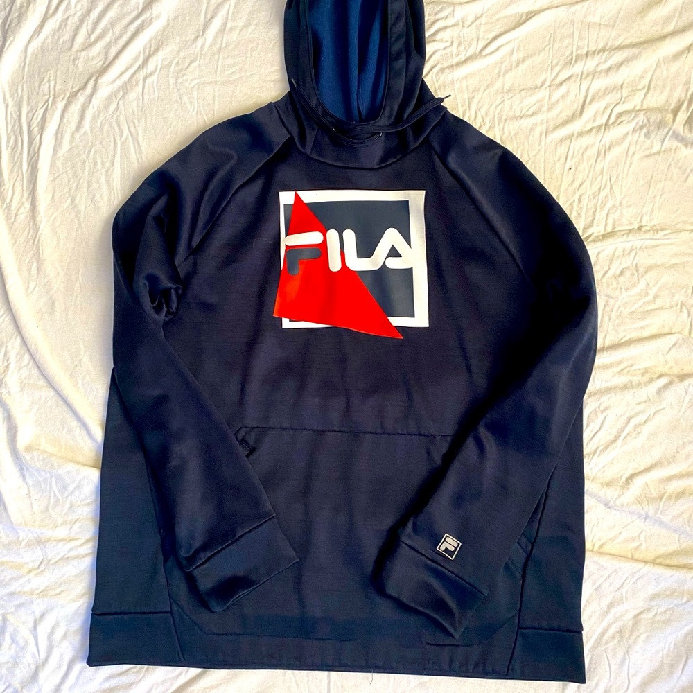 Navy blue Fila hooded sweatshirt. Good condition 100% polyester. Front logo